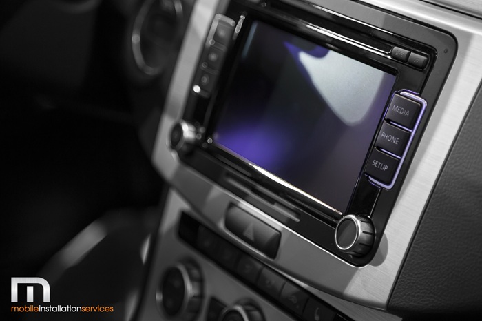 How can I ensure compatibility when integrating multiple aftermarket systems in my vehicle?